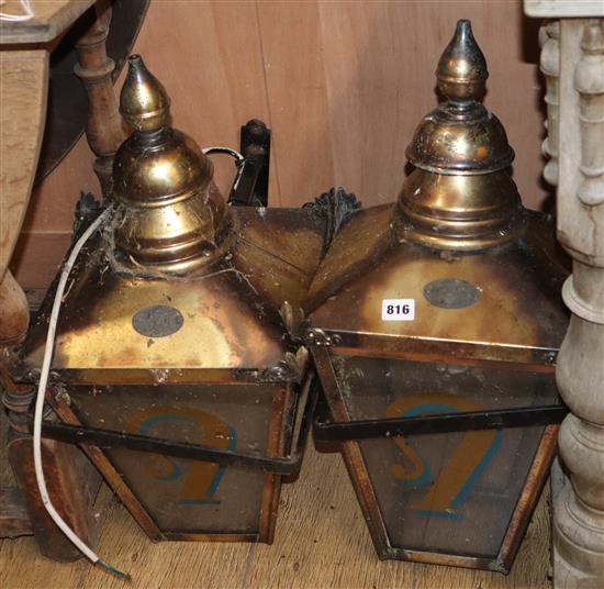 A set of three Victorian style street lamps and brackets by D. W. Windsor, England Height 55cm